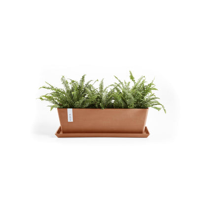 Kukkaruukku Bruge 65cm terracotta – aluslautasen ja kasvin kanssa