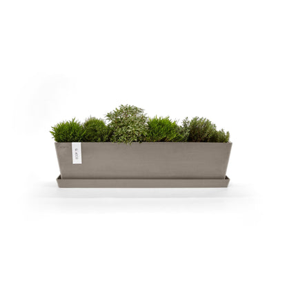 Kukkaruukku Bruge 80cm taupe – aluslautasen ja kasvin kanssa